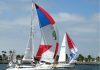 2 colorful boats of the 59 racing in the 8th Annual HospiceCare Benefit Regatta.jpg