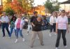 Line Dance instructor Diane Rojas, far right, dances with her students to Concert on the Promenade..jpg