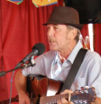 WEBJohn Locklar, an El Cajon based musician with strong family ties, rocks the stage at the Greek Sombrero-3.jpg