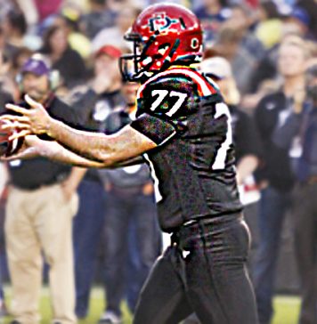 WEBChristian High School alumnus Joel Alesi prepares to punt in a recent game for the SDSU Aztecs. Photo by Paul Martinez.jpg