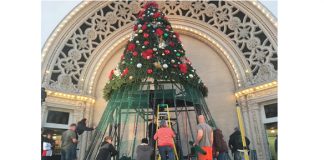 WEBDel Cerro Baptist Church members work together to build up the Christmas Story Tree for the performances at December Nights on the Prado.jpg