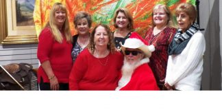 WEBWieghorst Museum Ladies with Cowboy Santa.jpg