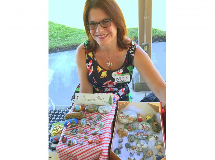 WEBLaura Street came to the Rock Party with her painted treasures for trading and display.jpg
