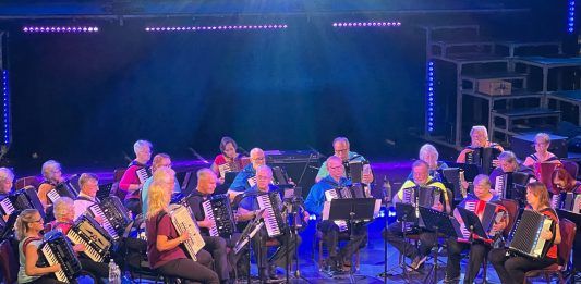 Musicians gather in accordions with each other